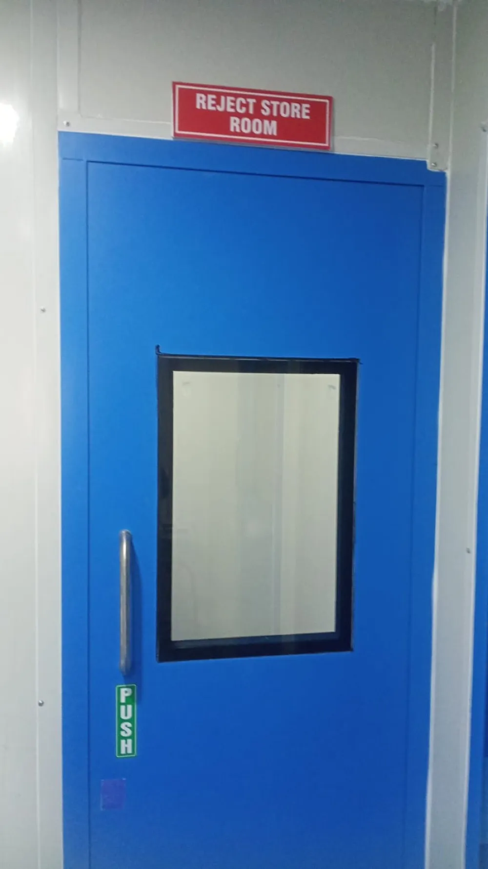 Segregated reject store room with signage above the door