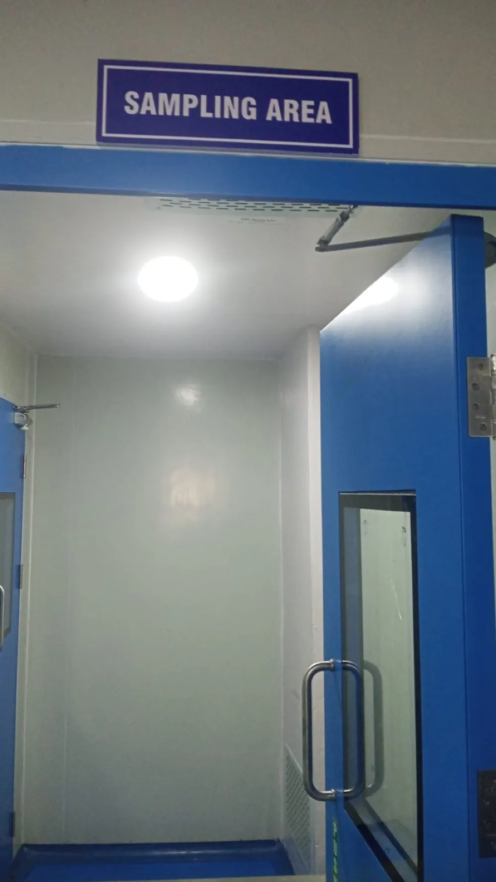 Segregated sampling area with signage above the door