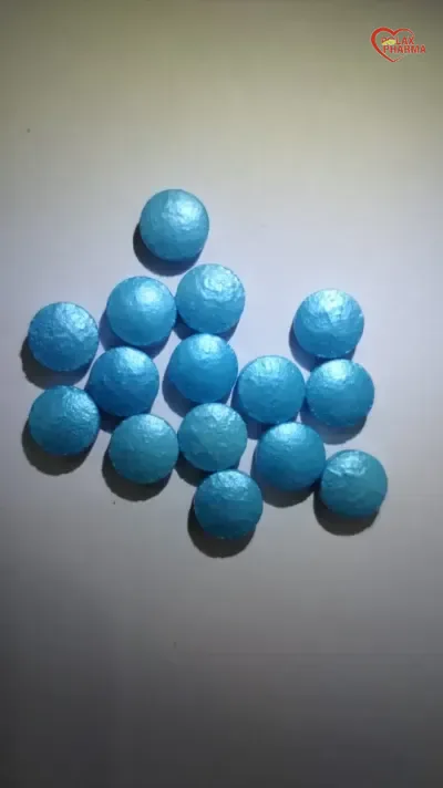 Metallic blue round coated tablets